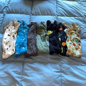 7 pack of footed 2-way zip-up sleepers